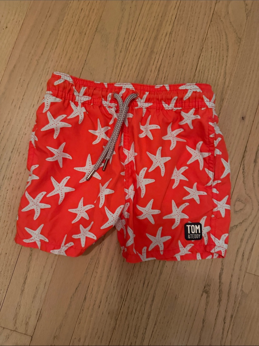 Tom & Teddy Bright Orange Starfish Swim Shorts
